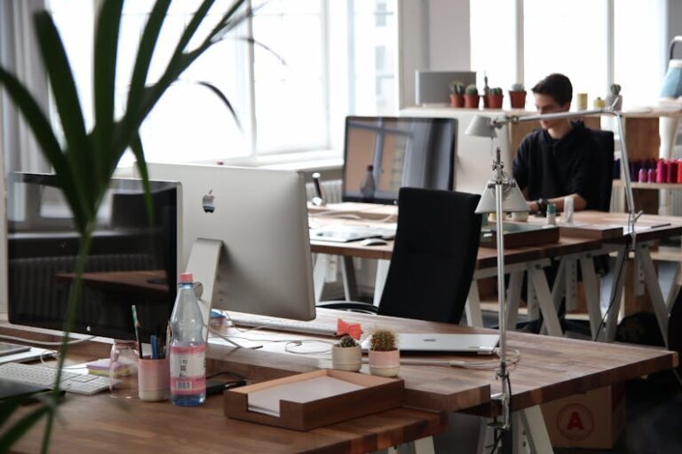 Open-plan office with modern decor and natural lighting, ideal for productivity.